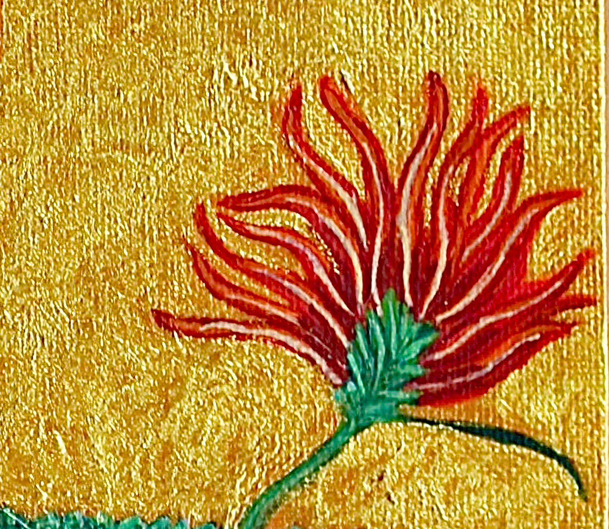 Red flower with green stem on a gold textured background