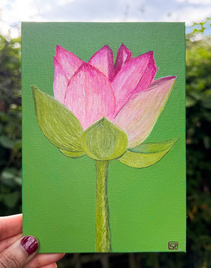 A painting of a pink lotus flower and stem against a bright green background