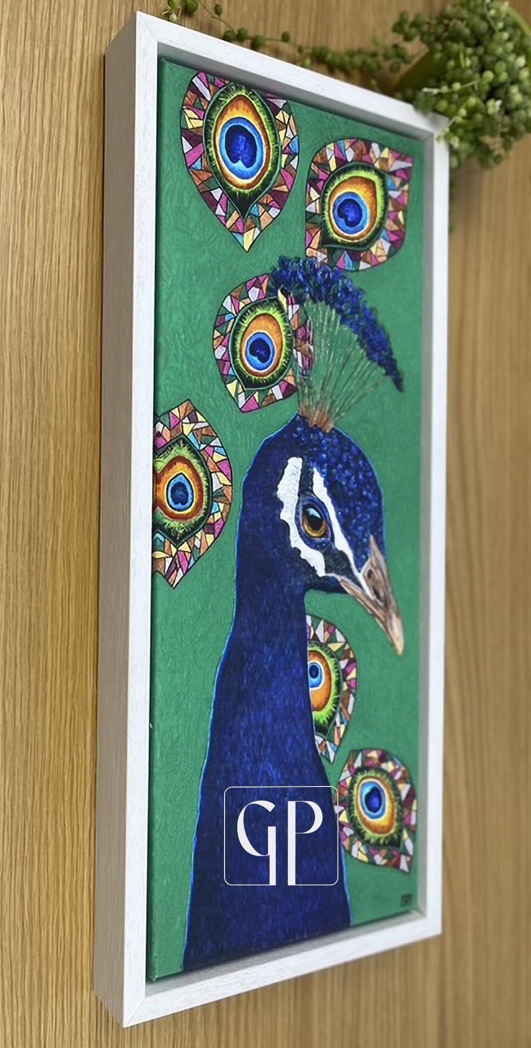 'Mayura': Canvas Prints. Head & neck of a peacock against green background. Stained glass feathers convey his divinity.